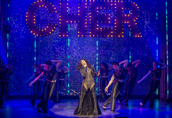 Debbie Kurup as Star (centre) in The Cher Show - Pamela Raith